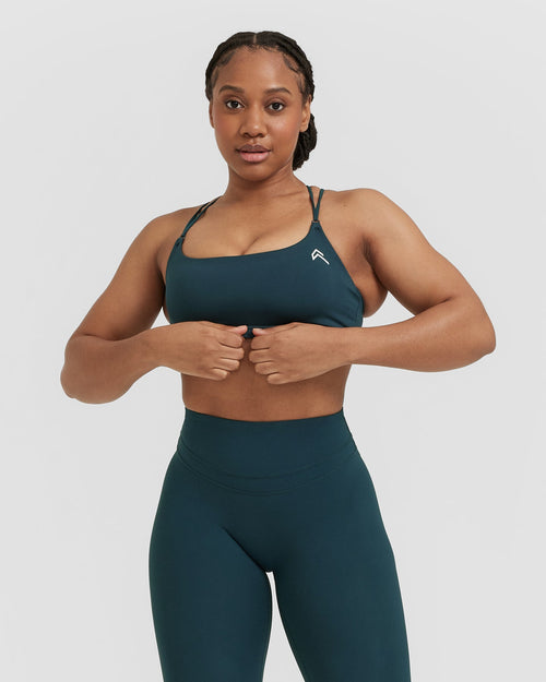 Courage Plunge Neck Wrap Over Sports Bra in Blue