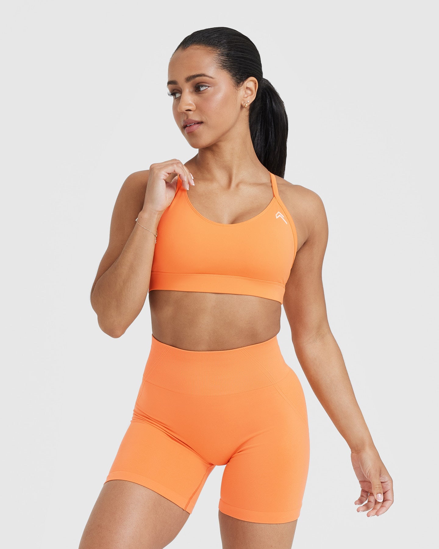 Reebok Ladies Ultima Orange Seamless Sports Bra, Size Medium